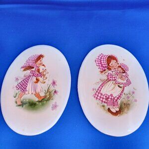set of 2 vintage 1970s gingham girl ceramic oval wall plaques